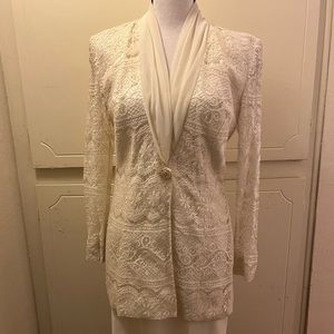 Beautiful long blouse 29 inches long.